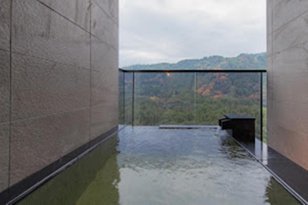 Отель Okuhita Onsen Umehibiki Экстерьер фото